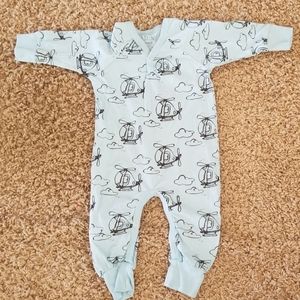 Light blue romper with helicopters
